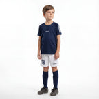 Personalisiertes marineblaues Kinder-Fußballset mit Namen und Nummer