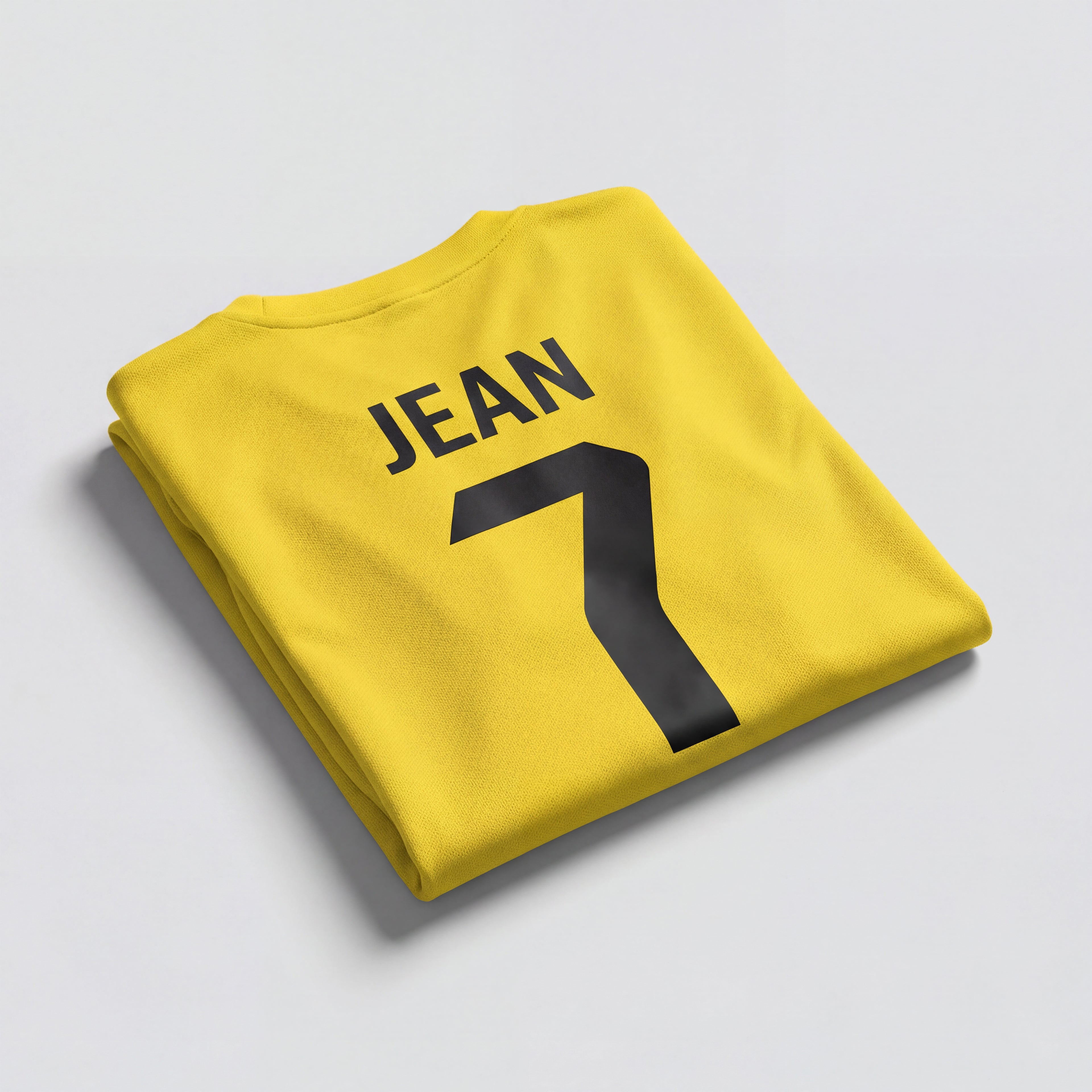 Personalisiertes gelbes Fußballtrikot mit Namen und Nummer